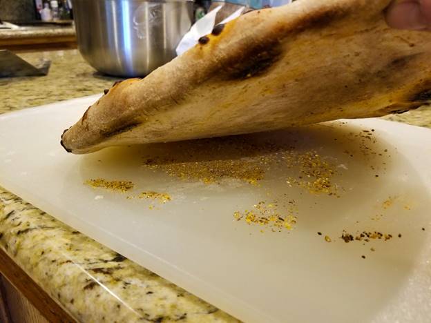 A piece of food on a plate

Description automatically generated with medium confidence