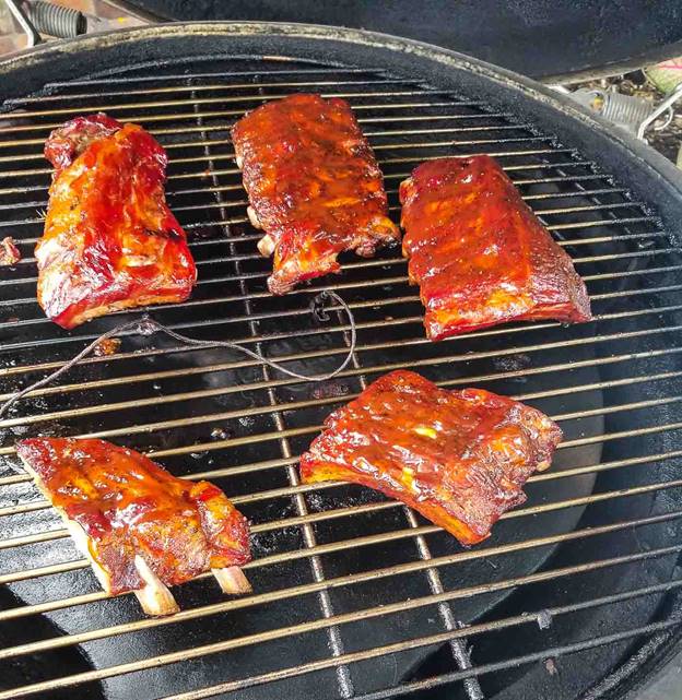 A picture containing pizza, grill, rack, metal

Description automatically generated