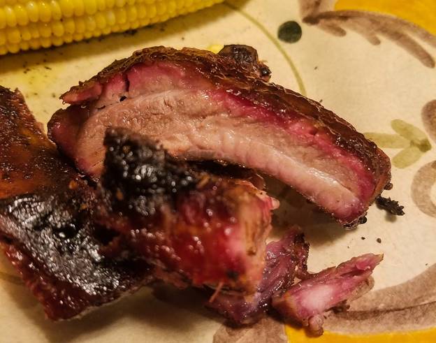 A piece of cooked meat on a plate

Description automatically generated with low confidence